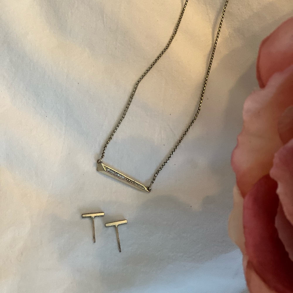 Kendra Scott gold bar necklace and earrings with crystal diamonds